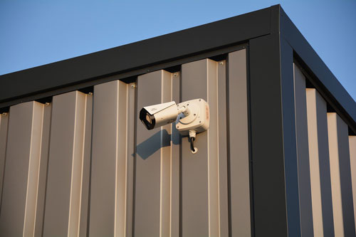 HD over coax security camera on building corner